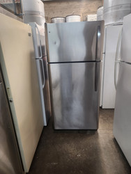 Frigidaire 30 Inch Top Freezer Refrigerator with 18 cu. ft. Capacity, Adjustable Glass Shelves, Store-More™ Drawers, Store-More™ Gallon Shelf, 1/2 Width Deli Drawer, Clear Dairy Bin, Reversible Door Stainless COSMETIC ISSUE ON FREEZER DOOR SKU 19698