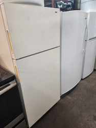 HOTPOINT 14 CUBIC FOOT RERIGERATOR TOP FREEZER WIRE SHELVES 2 CRISPER DRAWERS BISQUE LOCATED IN OUR PORTLAND OREGON APPLIANCE STORE SKU 19699