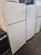 HOTPOINT 14 CUBIC FOOT RERIGERATOR TOP FREEZER WIRE SHELVES 2 CRISPER DRAWERS BISQUE LOCATED IN OUR PORTLAND OREGON APPLIANCE STORE SKU 19699