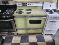 GE VINTAGE 40 INCH DOUBLE OVEN COIL BURNERS 2 LARGE 2 SMALL PUSH BUTTON SWITCHES WINDOW IN LARGE OVEN DOOR 2 STORAGE DRAWERS AVOCADO GREEN LOCATED IN OUR PORTLAND OREGON APPLIANCE STORE SKU 19719
