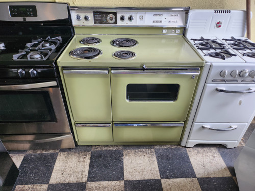GE VINTAGE 40 INCH DOUBLE OVEN COIL BURNERS 2 LARGE 2 SMALL PUSH BUTTON SWITCHES WINDOW IN LARGE OVEN DOOR 2 STORAGE DRAWERS AVOCADO GREEN LOCATED IN OUR PORTLAND OREGON APPLIANCE STORE SKU 19719
