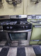 KENMORE 30 INCH FREE STANDING 4 BURNER GAS RANGE WITH POWER BURNER AND SIMMER BURNER SELF CLEANING OVEN BLACK AND STAINLESS LOCATED IN OUR PORTLAND OREGON APPLIANCE STORE SKU 19722