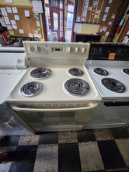 GE 30 INCH FREESTANDING ELECTRIC RANGE COIL BURNER 2 LARGE 2 SMALL MANUAL CLEAN OVEN STORAGE DRAWER BISQUE LOCATED IN OUR PORTLAND OEGON APPLIANCE STORE SKU 19750