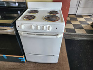 HOTPOINT 24 INCH ELECTRIC RANGE COIL BURNERS 3 SMALL 1 LARGE MANUAL CLEAN OVEN COSMETIC ISSUES TOP OF OVEN DOOR SEE PICS WHITE LOCATED IN OUR PORTLAND OREGON APPLIANCE STORE SKU 19760