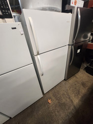 FRIGIDAIRE 18 CUBIC FOOT FRIGIDAIRE TOP FREEZER WIRE SHELVES 2 CRISPER DRAWERS WITH GLASS COVER FULL WIDTH WIRE SHELF IN FREEZER WHITE LOCATED IN OUR PORTLAND OREGON APPLIANCE STORE SKU 19786