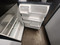 Whirlpool 18.2 cu. ft. Top-Freezer Refrigerator with 2 Wire Shelves, Automatic Defrost, 5 Door Bins, 2 Clear Crispers, Clear Meat Pan and Up-Front Temperature Controls: Black LOCATED IN OUR POTLAND OREGON APPLIANCE STORE SKU 19839