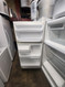 HOTPOINT 14 CUBIC FOOT REFRIGERATOR TOP FREEZER WIRE SHELVES 2 CRISPER DRAWERS FEWDINGS IN REFRIGERATOR DOOR SEE PIC WHITE LOCATED IN OUR PORTLAND OREGON APPLIANCE STORE SKU 19841