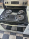 GE 30 INCH FREESTANDING ELECTRIC RANGE COIL BURNERS 2 LARGE 2 SMALL HI LO BROIL SETTING SELF CLEANING OVEN BLACK AND STAINLESS LOCATED IN OUR PORTLAND OREGON APPLIANCE STORE SKU 19847