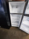 GE 16 CUBIC FOOT REFRIGERATOR TOP FREEZER FULL WIDTH GLASS SHELVES 2 CRISPER DRAWERS WIRE SHELF IN FREEZER STAINLESS LOCATED IN OUR PORTLAND OREGON APPLIANCE STORE SKU 19878