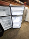 GE 16 CUBIC FOOT REFRIGERATOR TOP FREEZER FULL WIDTH GLASS SHELVES 2 CRISPER DRAWERS WIRE SHELF IN FREEZER STAINLESS LOCATED IN OUR PORTLAND OREGON APPLIANCE STORE SKU 19878
