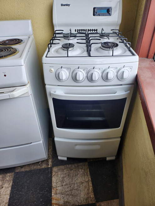 Danby 20 Inch Freestanding Gas Range with 2.62 cu. ft. Manual Clean Oven, 4 Sealed Burners, Glass Door Window and Broiler Drawer WHITE LOCATED IN OUR PORTLAND OREGON APPLIANCE STORE SKU 19879