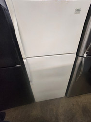 ESTATE BY WHIRLPOOL 18 CUBIC FOOT REFRIGERATOR TOP FREEZER FULL WIDTH ADJUSTABLE GLASS SHELVES 2 CRISPER DRAWERS GLASS SHELF IN FREEZER BISQUE LOCATED IN OUR PORTLAND OREGON APPLIANCE STORE SKU 19885