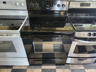 WHIRLPOOL 30 INCH FREESTANDING GLASS TOP RANGE 4 BURNER 1 LARGE DUAL 1 LARGE 2 SMALL SELF CLEANING OVEN BLACK LOCATED IN OUR PORTLAND OREGON APPLIANCE STORE SKU 19895