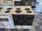 ROPER BY WHIRLPOOL 30 INCH FREESTANDING ELECTRIC RANGE COIL BURNERS 2 LARGE 2 SMALL SELF CLEANING OVEN ALMOND WITH BLACK GLASS DOOR LOCATED IN OUR PORTLAND OREGON APPLIANCE STORE SKU 19906