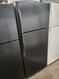 GE 28 Inch Top Freezer Refrigerator with 17.5 Cu. Ft. Total Capacity, Adjustable Edge to Edge Glass Shelves, Sliding Deli Drawer, LED Lighting, Spillproof Freezer Floor, Gallon Door Storage BLACK LOCATED IN OUR PORTLAND OREGON APPLIANCE STORE SKU 19914