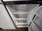 ESTATE BY WHIRLPOOL 18 CUBIC FOOT REFRIGERATOR TOP FREEZER GLASS SHELVES 2 CRISPER DRAWERS COSMETIC ISSUE ON REFRIGERATOR SEE PIC SILVER LOCATED IN OUR POTLAND OREGON APPLIANCE STORE SKU 19940