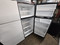 ESTATE BY WHIRLPOOL 18 CUBIC FOOT REFRIGERATOR TOP FREEZER GLASS SHELVES 2 CRISPER DRAWERS COSMETIC ISSUE ON REFRIGERATOR SEE PIC SILVER LOCATED IN OUR POTLAND OREGON APPLIANCE STORE SKU 19940
