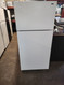 HOTPOINT 16 CUBIC FOOT REFRIGERATOR TOP FREEZER WIRE SHELVES LARGE SINGLE CRISPER DRAWER WHITE LOCATED IN OUR PORTLAND OREGON APPLIANCE STORE SKU 19948