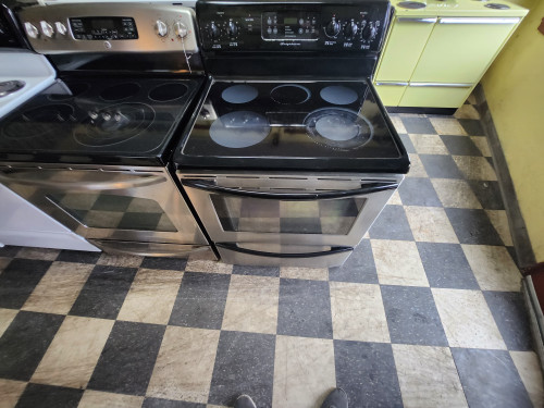 FRIGIDAIRE 30 INCH FREESTANDING ELECTRIC RANGE GLASS TOP  5 BURNER SELF CLEANING OVEN BLACK AND STAINLESS LOCATED IN OUR PORTLAND OREGON APPLIANCE STORE SKU 19958