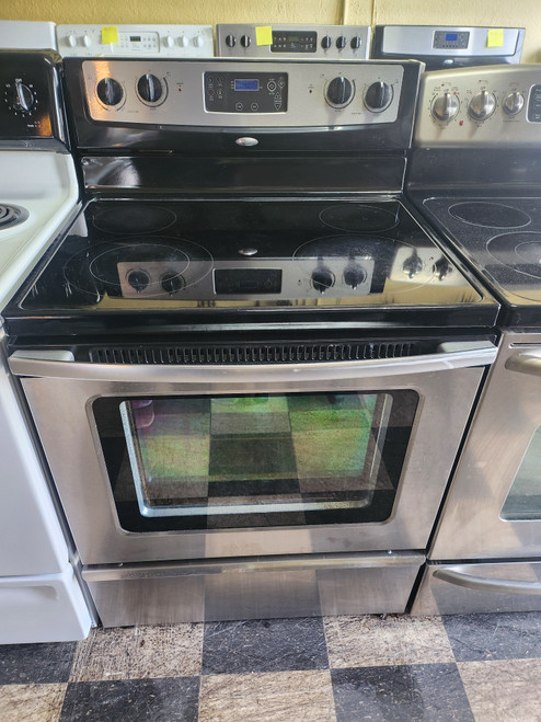 WHIRLPOOL 30 INCH FREESTANDING 4 BURNER GLASS TOP ELECTRIC RANGE SELF CLEANING OVEN BLACK STAINLESS LOCATED IN OUR PORTLAND OREGON APPLIANCE STORE SKU 19964