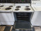 HOTPOINT 30 INCH ELECTRIC FREESTANDING RANGE COIL BURNERS 2 LARGE 2 SMALL HI LO BROIL SETTING SELF CLEANING OVEN WHITE WITH BLACK GLASS OVEN DOOR NO WINDOW LOCATED IN OUR PORTLAND OREGON APPLIANCE STORE SKU 19994