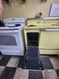 GE VINTAGE 40 INCH DOUBLE OVEN MANAUL CLEAN OVEN COIL BURNERS 3 SMALL 1 LARGE PUSH BUTTON BURNER SWITCHES 2 STORAGE DRAWERS PALE/ LEMON YELLOW LOCATED IN OUR PORTLAND OREGON APPLIANCE STORE SKU 20007