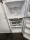 GE 18 CUBIC FOOT REFRIGERATOR TOP FREEZER GLASS SHELVES 2 CRISPER DRAWERS 1 DELI WIRE SHELF IN FREEZER WHITE LOCATED IN OUR PORTLAND OREGON APPLIANCE STORE SKU 20014