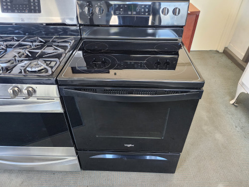 Whirlpool 30 Inch Freestanding Electric Range with Flex Heat Frozen Bake Technology, Adjustable Self-Cleaning, Spill Guard Cooktop, Keep Warm Setting, Temperature Sensor, Closed Door Broiling, Warm Zone Element Black SKU 20025