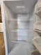 KENMORE 14 CUBIC FOOT UPRIGHT FREEZER AUTO DEFOST 3 SHELVES 5 STORAGE SHELVES IN DOOR WHITE LOCATED IN OUR PORTLAND OREGON APPLIANCE STORE SKU 20054
