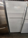 GE 18 CUBIC FOOT REFRIGERATOR TOP FREEZER GLASS SHELVES 1 DELI DRAWER 2 CRISPER DRAWERS WIRE SHELF IN FREEZER COSMETIC ISSUE ON REFRIGERATOR DOOR SEE PIC WHITE LOCATED IN OUR PORTLAND OREGON APPLIANCE STORE SKU 20058