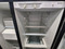KENMORE SIDE BY SIDE REFRIGERATOR WITH ICE AND WATER GLASS SHELVES 3 STORAGE DRAWERS WIRE SHELVES IN FREEZER SILVER LOCATED IN OUR PORTLAND OREGON APPLIANCE STORE SKU 20060