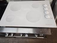 FRIGIDAIRE 30 INCH WHITE GLASS COOKTOP 4 BURNERS 2 LARGE 2 SMALL LOCATED IN OUR PORLAND OREGON APPLIANCE STORE SKU 20075