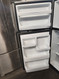 GE 18 CUBIC FOOT REFRIGERATOR TOP FREEZER GLASS SHELVES 1 FULL WIDTH 2 HALF SHELVES 2 CRISPER DRAYERS WIRE SHELF IN FREEZER UP FRONT CONTROLS SILVER LOCATED IN OUR PORTLAND OREGON APPLIANCE STORE SKU 20079