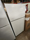 HOTPOINT 17 CUBIC FOOT REFRIGERATOR TOP FREEZER ADJUSTABLE WIRE RACKS 2 CRISPER DRAWERS WIRE SHELF IN FREEZER COSMETIC ISSUES ON DOORS SEE PICS WHITE LOCATED IN OUR PORTLAND OREGON APPLIANCE STORE SKU 21013