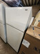 HOTPOINT 17 CUBIC FOOT REFRIGERATOR TOP FREEZER ADJUSTABLE WIRE RACKS 2 CRISPER DRAWERS WIRE SHELF IN FREEZER COSMETIC ISSUES ON DOORS SEE PICS WHITE LOCATED IN OUR PORTLAND OREGON APPLIANCE STORE SKU 21013