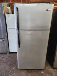Frigidaire FRT18B5JM 18.2 cu. ft. Top-Freezer Refrigerator with 2 Sliding Wire Shelves, 2 Clear Crispers and 1 Humidity Control: Silver Mist COSMETIC ISSUE ON REFRIGERATOR DOOR SEE PIC LOCATED IN OUR PORTLAND OREGON APPLIANCE STORE SKU 21034