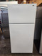 HOTPOINT 15 CUBIC FOOT REFRIGERATOR TOP FREEZER WIRE SHELVES LARGE SINGLE CRISPER FEW DINGS ON LOWER NEAR THE BOTTOM SEE PIC WHITE LOCATED IN OUR PORTLAND OREGON APPLIANCE STORE SKU 21052