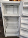 HOTPOINT 15 CUBIC FOOT REFRIGERATOR TOP FREEZER WIRE SHELVES LARGE SINGLE CRISPER FEW DINGS ON LOWER NEAR THE BOTTOM SEE PIC WHITE LOCATED IN OUR PORTLAND OREGON APPLIANCE STORE SKU 21052