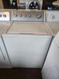 WHIRLPOOL COMMERCIAL QUALITY SUPER CAPACITY PLUS TOP LOAD WASHER 21 CYCLE 3 SPEED MOTOR 5 TEMPERATURE SETTINGS 3 MANUAL 2 AUTO 2ND RINSE SMALL DENT ON TOP OF PANEL OPTION WHITE LOCATED IN OUR PORTLAND OREGON APPLIANCE STORE SKU 21059