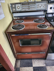 GE VINTAGE 30 INCH FREESTANDING ELECTRIC RANGE COIL BURNERS 2 LARGE 2 SMALL PUSH BUTTON SWITCHES MANUAL STORAGE DRAWER WINDOW IN DOOR COPPER TONE LOCATED IN OUR PORTLAND OREGON APPLIANCE STORE SKU 21096