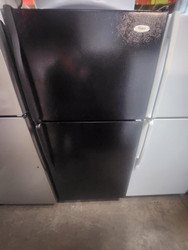 WHIRLPOOL 18 CUBIC FOOT REFRIGERATOR TOP FREEZER ADJUSTABLE WIRE SHELVES 2 CRISPER DRAWERS 1 DELI DRAWER FULL WIDTH SHELF IN FREEZER BLACK LOCATED IN OUR PORTLAND OREGON APPLIANCE STORE SKU 22033