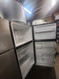 WHIRLPOOL 18 CUBIC FOOT REFRIGERATOR TOP FREEZER ADJUSTABLE WIRE SHELVES 2 CRISPER DRAWERS 1 DELI DRAWER FULL WIDTH SHELF IN FREEZER BLACK LOCATED IN OUR PORTLAND OREGON APPLIANCE STORE SKU 22033