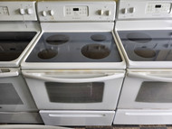 FRIGIDAIRE 30 INCH FREESTANDING GLASS TOP ELECTRIC RANGE 4 BURNERS 2 LARGE 2 SMALL SELF CLEANING OVEN COSMETIC ISSUES ON CONTROL PANEL SEE PICS WHITE LOCATED IN OUR PORTLAND OREGON APPLIANCE STORE SKU 22037