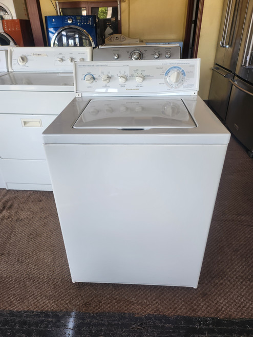 KITCHENAID HEAVY DUTY SUPER CAPACITY PLUS TOP LOAD WASHER WITH 3 SPEED MOTOR 14 CYCLES 5 WATER LEVELS EXTRA RINSE 4 TEMPEATURES WITH 1 WARM RINSE WHITE LOCATED IN OUR POTLAND OREGON APPLIANCE STORE SKU 22064