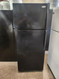 WHIRLPOOL 18 CUBIC FOOT REFRIGERATOR TOP FREEZER AUTOMATIC DEFROST GLASS SHELVES 2 CRISPER DRAWERS 1 DELI DRAWER BLACK LOCATED IN OUR PORTLAND OREGON APPLIANCE STORE SKU 22073