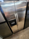 KENMORE SIDE BY SIDE REFRIGERATOR WITH ICE AND WATER AT DOOR GLASS SHELVES 3 STORGE DRAWERS WIRE SHELVES IN FREEZER PLUS PULL-OUT BIN STAINLESS LOCATED IN OUR PORTLAND OREGON APPLIANCE STORE SKU 22074