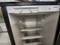 KENMORE SIDE BY SIDE REFRIGERATOR WITH ICE AND WATER AT DOOR GLASS SHELVES 3 STORGE DRAWERS WIRE SHELVES IN FREEZER PLUS PULL-OUT BIN STAINLESS LOCATED IN OUR PORTLAND OREGON APPLIANCE STORE SKU 22074