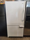AMANA 22 CUBIC FOOT REFRIGERATOR BOTTOM FEEZER GLASS SHELVES 2 CRISPER DRAWERS SWING OPEN FEEZER DOOR 2 PULL OUT BASKET WHITE LOCATED IN OUR PORTLAND OREGON APPLIANCE STORE SKU 22085
