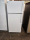 GE 28 Inch Top Freezer Refrigerator with 16.6 Cu. Ft. Capacity, LED Lighting, Adjustable Wire Shelves, Full-Width Door Shelves, Reversible Hinges, Frost-Free White LOCATED IN OUR PORLAND OREGON APPLIANCE STORE SKU 22087