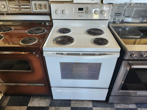 WHIRLPOOL 30 INCH FREESTANDING ELECTRIC RANGE COIL BURNERS 2 SMALL 2 LARGE KEEP WARM OPTION SELF CLEANING OVEN WHITE LOCATED IN OUR PORTLAND OREGON APPLIANCE STORE SKU 23032
